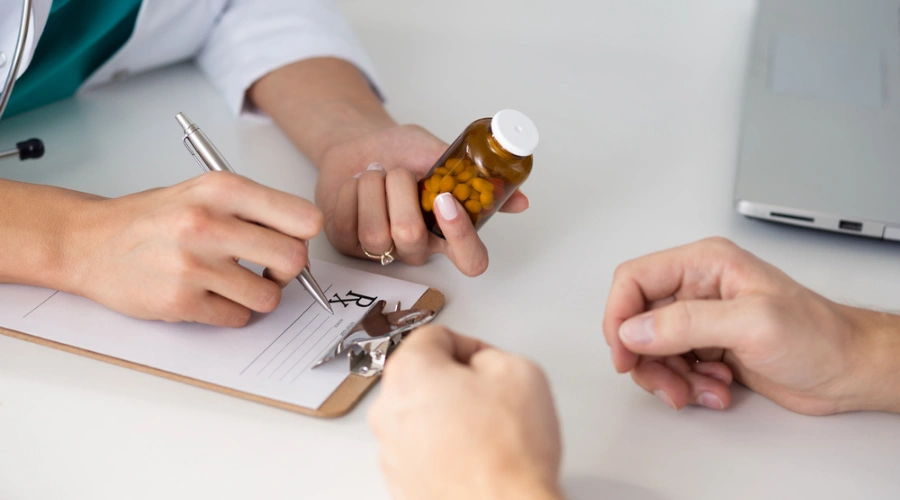 Doctor writing prescription and displaying Addiction Treatment with Medical Professionals for Tramadol
