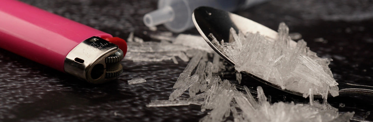 Image of crystal meth on a table - Can Meth Cause Depression - Icarus Nevada