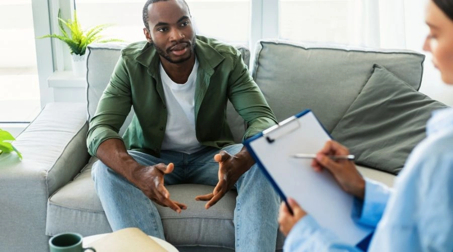 Man consulting with counselor displaying Judgment in Manic Episodes for Patients with Bipolar