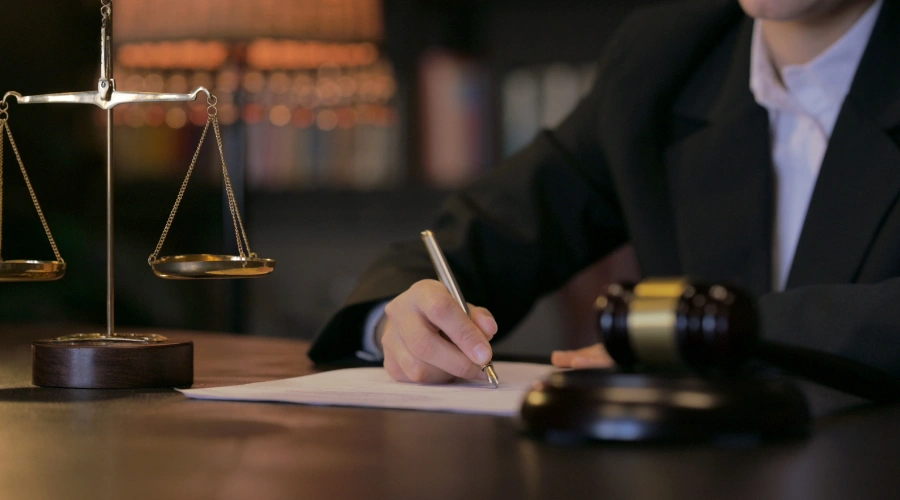 Image of Judge reviewing paperwork related to court-approved addiction treatment instead of jail