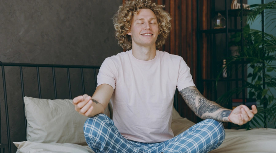 Image of a man practicing reflection and mindfulness as part of his daily AA Step 2 recovery routines