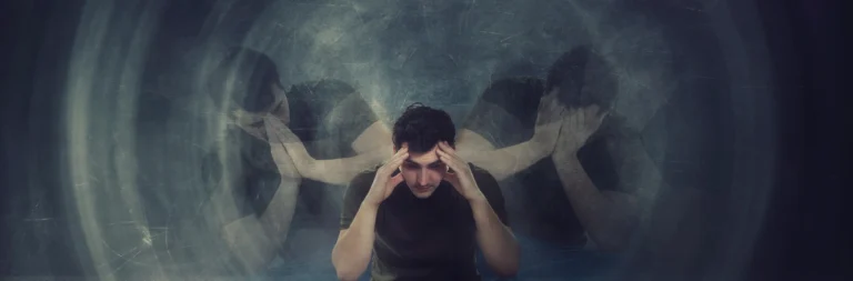 Image of a man suffering from delusions and hallucinations - Delusions vs Hallucinations - Icarus Behavioral Health Nevada